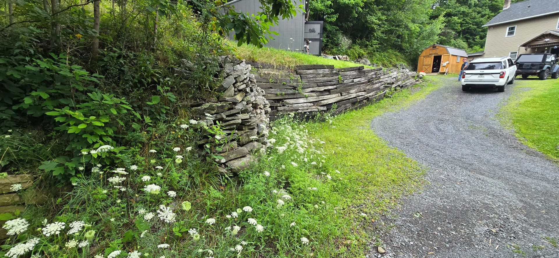 Failing Retaining Wall Replaced with Massive Concrete Block Wall in NEPA