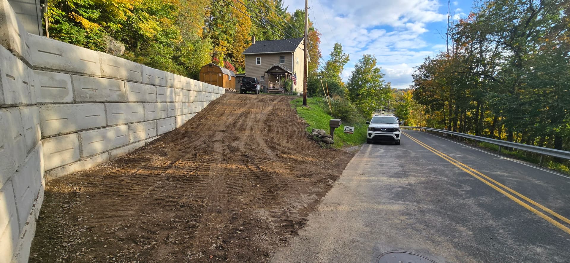 Gallery photos for Failing Retaining Wall Replaced with Massive Concrete Block Wall in NEPA: Image #7